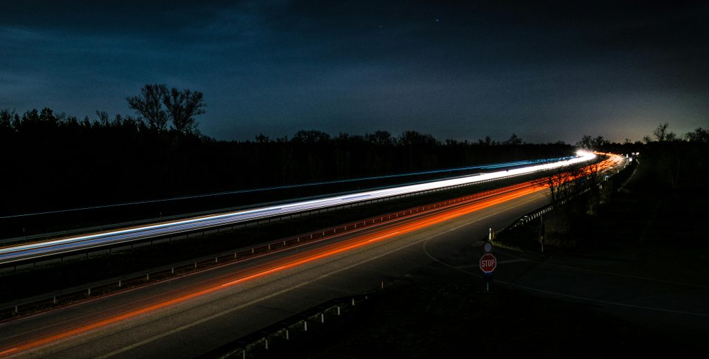 pexels-photo-434450-434450 Long exposure shot capturing vibrant light trails on a highway at night.